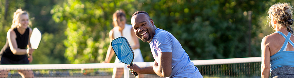 People playing pickleball